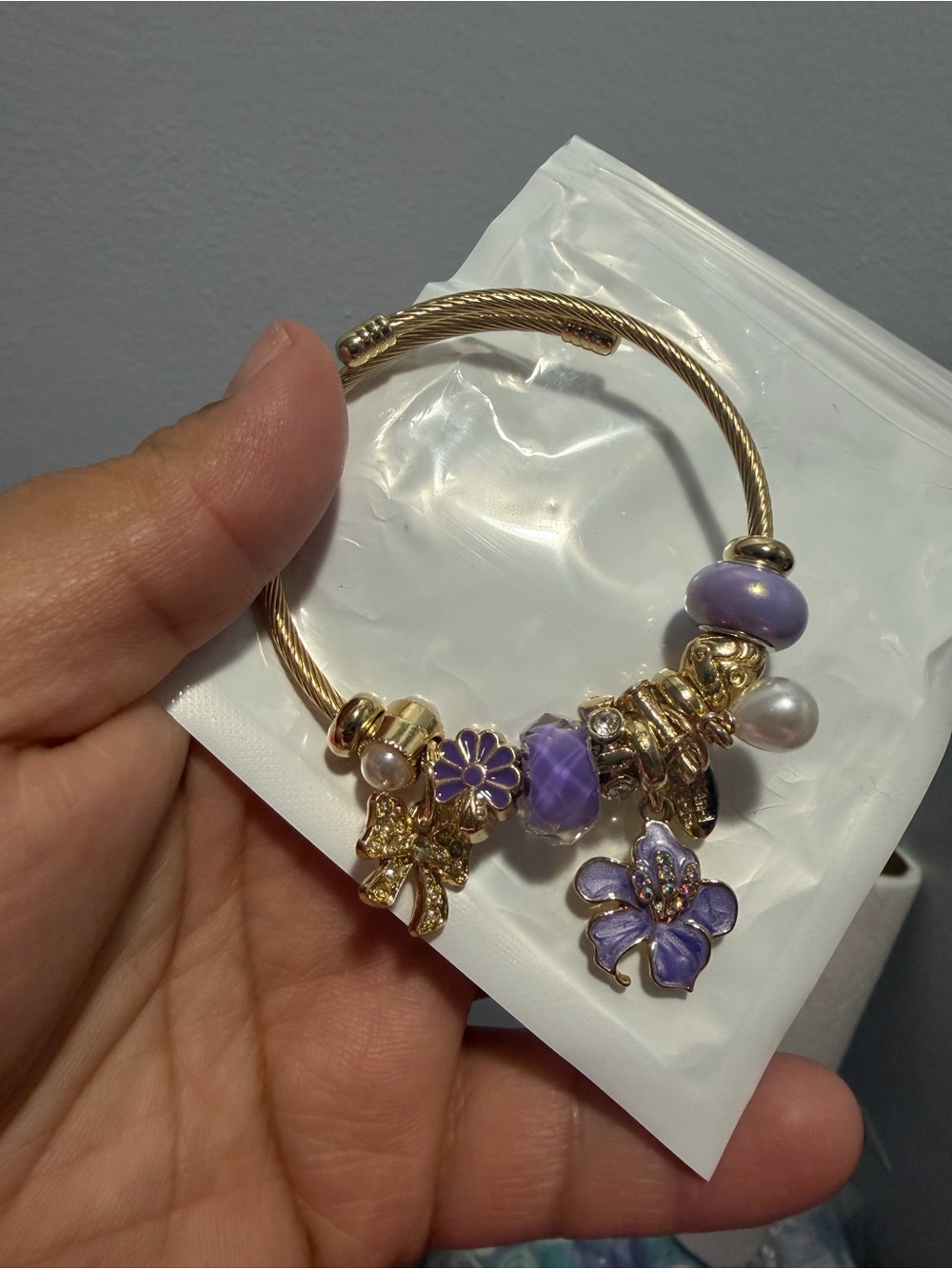 Gold-Tone Bracelet with Purple Flower Charms